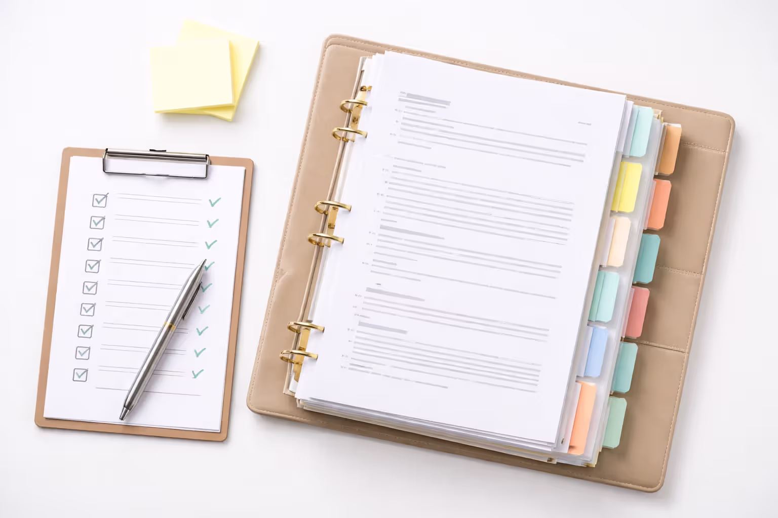 Organized folder with tabbed dividers, checklist, and sticky notes for structured settlement document preparation